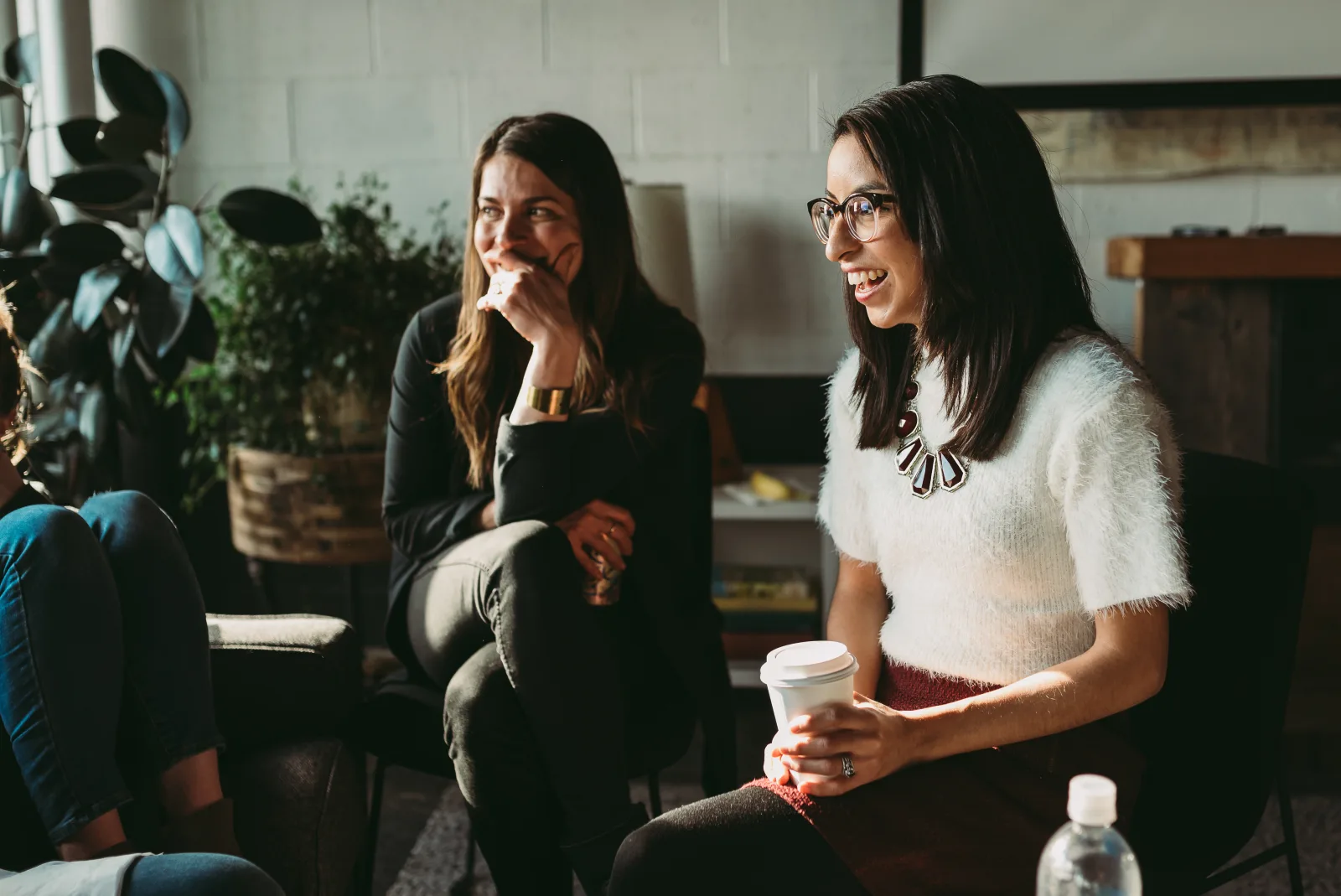 Two colleagues talking through an AI decision together in a live HumanSide session.